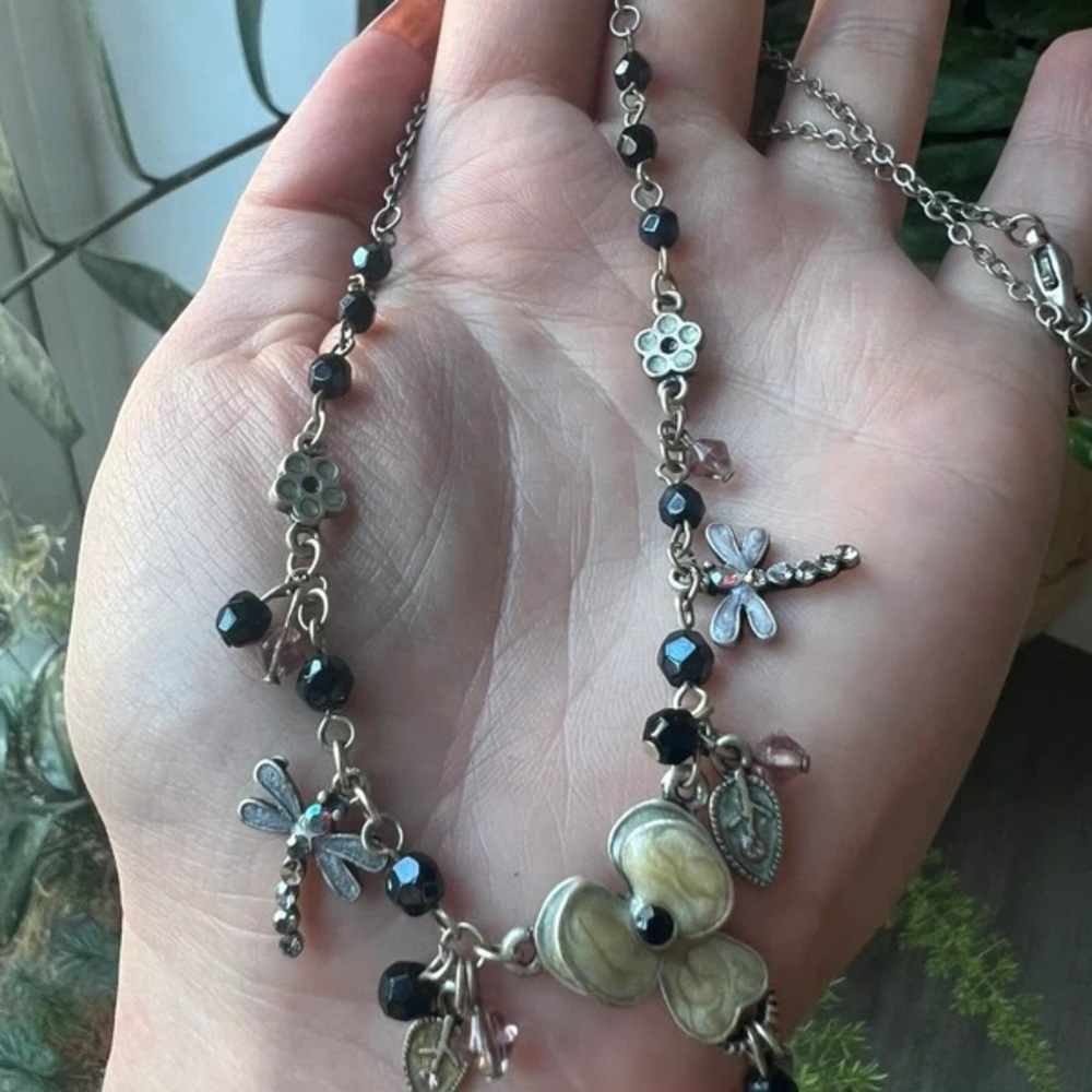 Chic Black and Silver Necklace with Floral and Dragonfly Charms